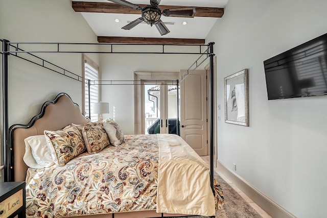 bedroom with beamed ceiling and ceiling fan