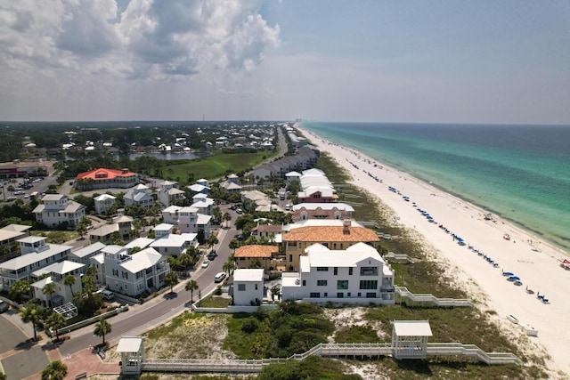 bird's eye view with a beach view and a water view