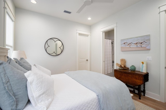 bedroom featuring visible vents, baseboards, recessed lighting, wood finished floors, and a ceiling fan