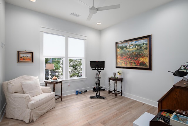 workout room featuring recessed lighting, visible vents, baseboards, and light wood finished floors