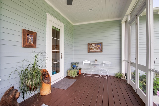 sunroom / solarium with wooden ceiling