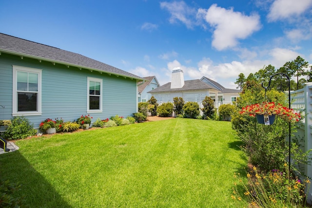 view of yard with fence