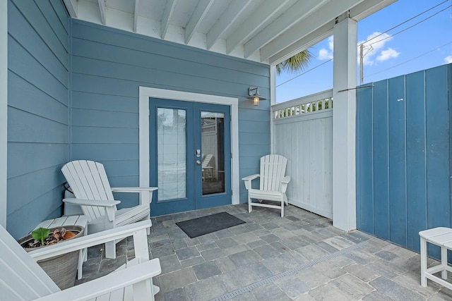 139 Brown St, Santa Rosa Beach, FL 32459 - view of exterior entry with a patio area and french doors