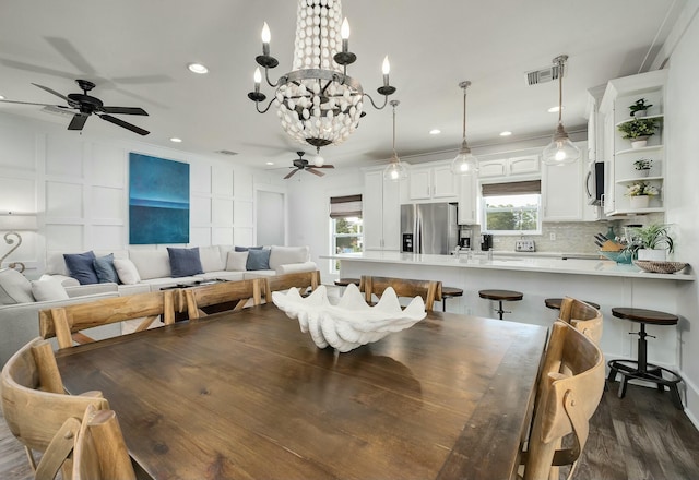 139 Brown St, Santa Rosa Beach, FL 32459 - dining room with dark wood-type flooring and ceiling fan