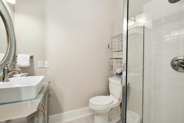 139 Brown St, Santa Rosa Beach, FL 32459 - bathroom featuring vanity, toilet, and a tile shower