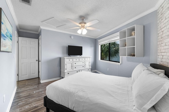 bedroom with ornamental molding, a textured ceiling, and dark hardwood / wood-style flooring