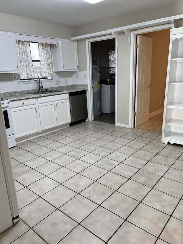 kitchen featuring white electric stove, light stone counters, a sink, white cabinetry, and dishwasher