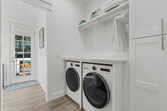 laundry room featuring washer and clothes dryer