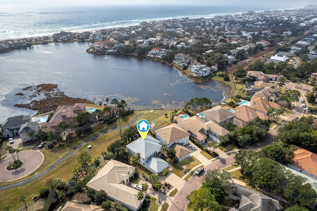 birds eye view of property featuring a water view