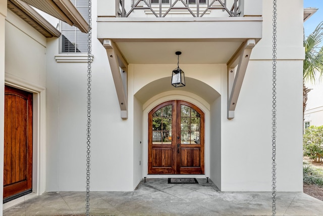 property entrance featuring french doors