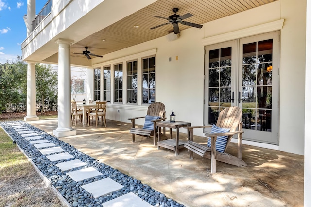 view of patio with ceiling fan and french doors