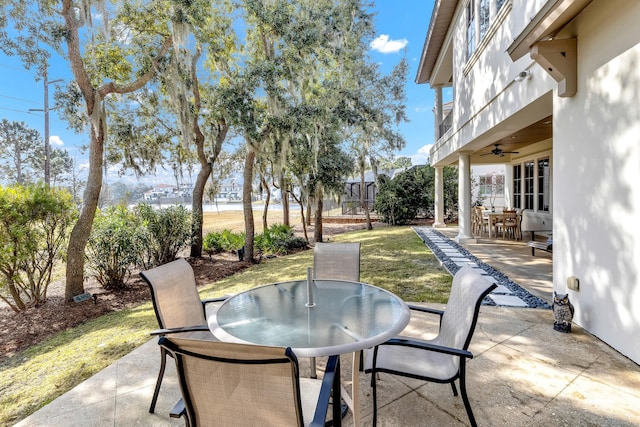 view of patio featuring ceiling fan