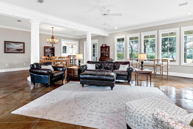 tiled living room with decorative columns, crown molding, and ceiling fan with notable chandelier