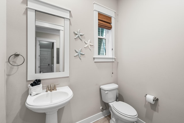 bathroom with toilet and sink