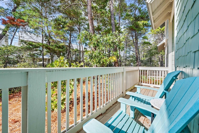 wooden balcony featuring a deck