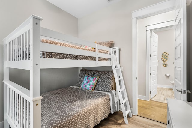 bedroom with wood-type flooring