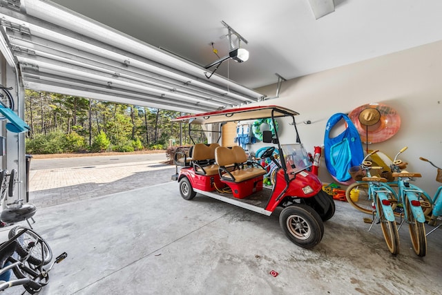 garage featuring a garage door opener