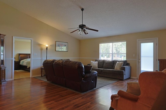 5205 Whitehurst Ln, Crestview, FL 32536 - living area featuring a textured ceiling, a ceiling fan, wood finished floors, and vaulted ceiling