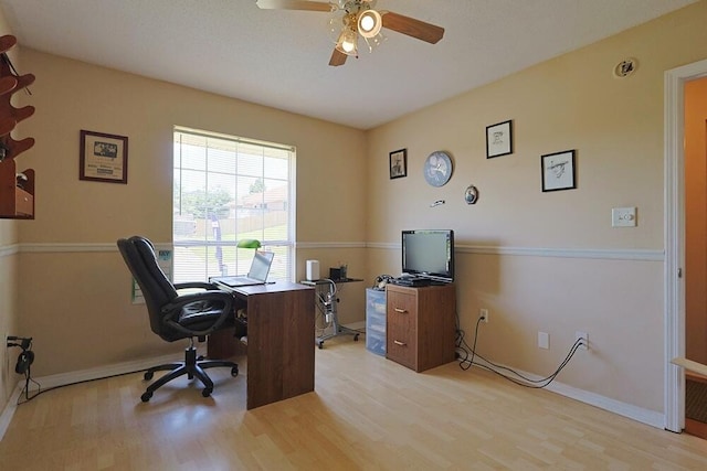 5205 Whitehurst Ln, Crestview, FL 32536 - office with light wood-type flooring, a ceiling fan, and baseboards