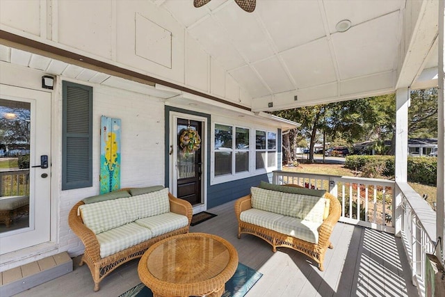 wooden terrace with a porch