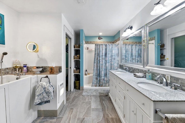 bathroom featuring double vanity, a shower with curtain, a tub to relax in, and a sink