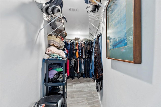 spacious closet with visible vents