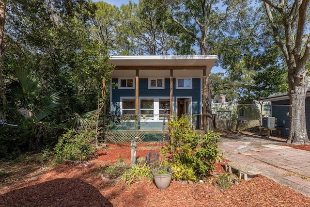 view of front of property featuring central air condition unit