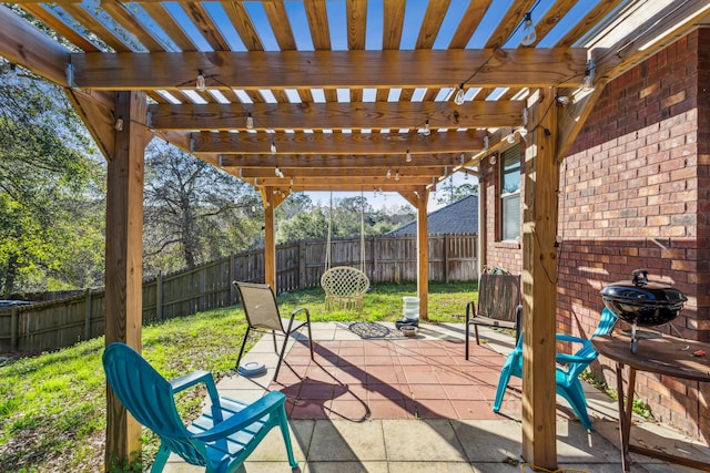 view of patio with a fenced backyard and a pergola