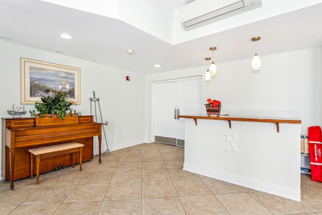 interior space featuring a wall mounted air conditioner and light tile patterned floors