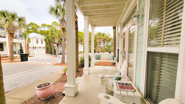 view of patio featuring a porch