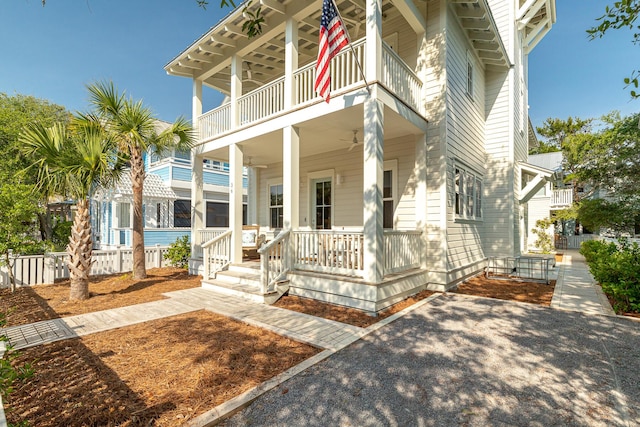 36 E Ruskin St, Santa Rosa Beach, FL 32459 - view of front of property featuring a porch and a balcony