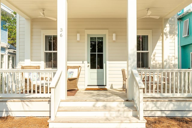 36 E Ruskin St, Santa Rosa Beach, FL 32459 - view of exterior entry featuring a porch and ceiling fan