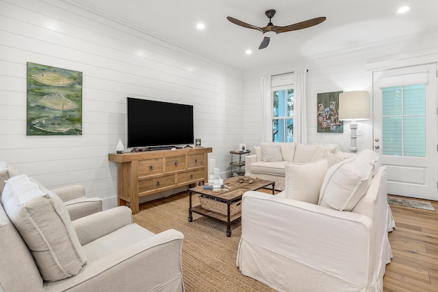 36 E Ruskin St, Santa Rosa Beach, FL 32459 - living room with crown molding, ceiling fan, and light wood-type flooring