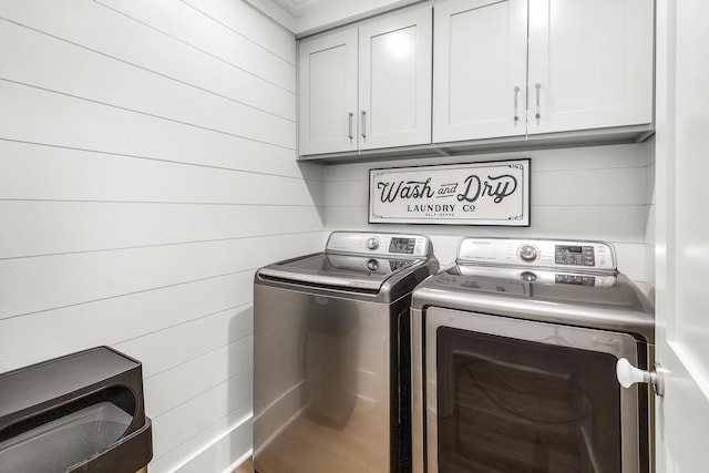 36 E Ruskin St, Santa Rosa Beach, FL 32459 - washroom featuring cabinets and washer and clothes dryer
