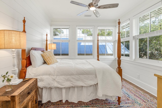 36 E Ruskin St, Santa Rosa Beach, FL 32459 - bedroom with multiple windows, ornamental molding, and ceiling fan