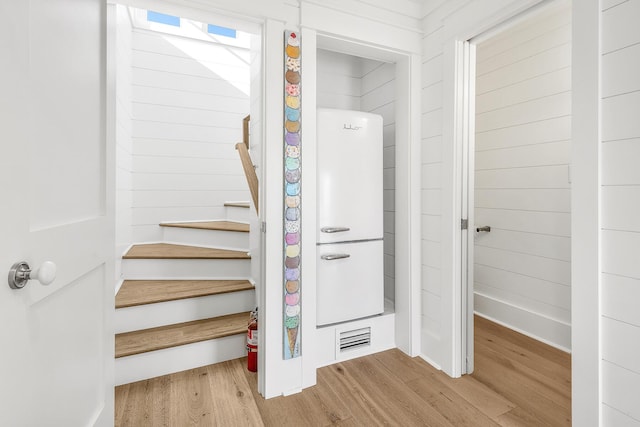 36 E Ruskin St, Santa Rosa Beach, FL 32459 - stairway with hardwood / wood-style flooring