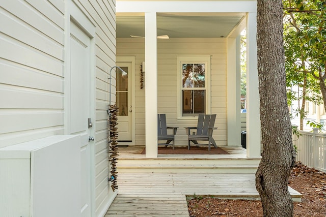 36 E Ruskin St, Santa Rosa Beach, FL 32459 - wooden deck featuring covered porch