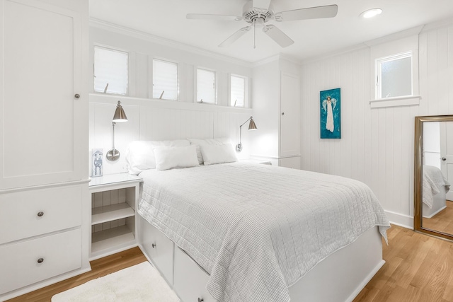 36 E Ruskin St, Santa Rosa Beach, FL 32459 - bedroom featuring ceiling fan, ornamental molding, and light hardwood / wood-style floors