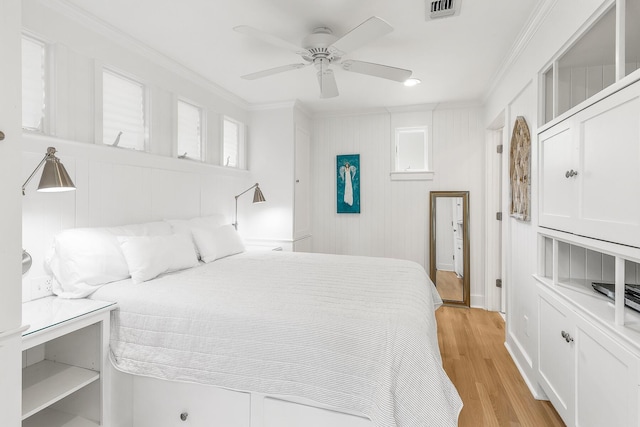 36 E Ruskin St, Santa Rosa Beach, FL 32459 - bedroom featuring crown molding, light hardwood / wood-style floors, and ceiling fan