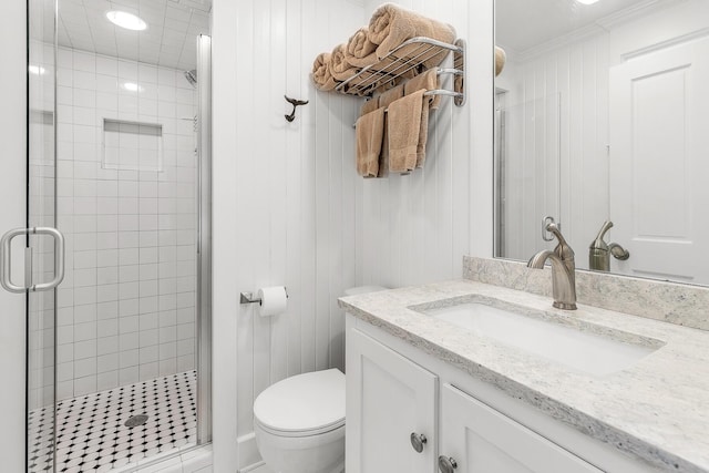 36 E Ruskin St, Santa Rosa Beach, FL 32459 - bathroom featuring vanity, ornamental molding, toilet, and walk in shower