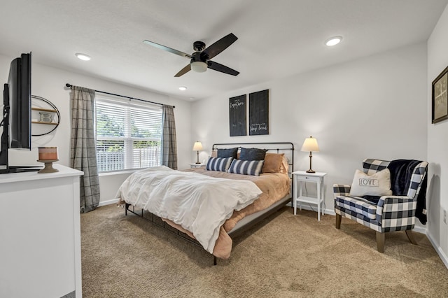 bedroom featuring baseboards, recessed lighting, and light colored carpet