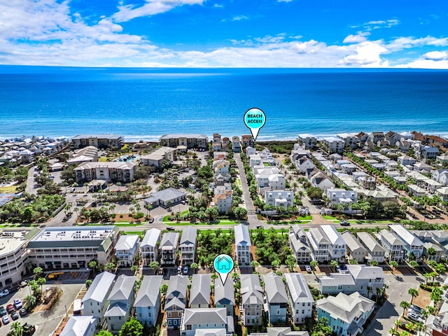 bird's eye view featuring a water view and a residential view