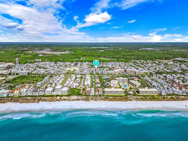 bird's eye view featuring a beach view and a water view