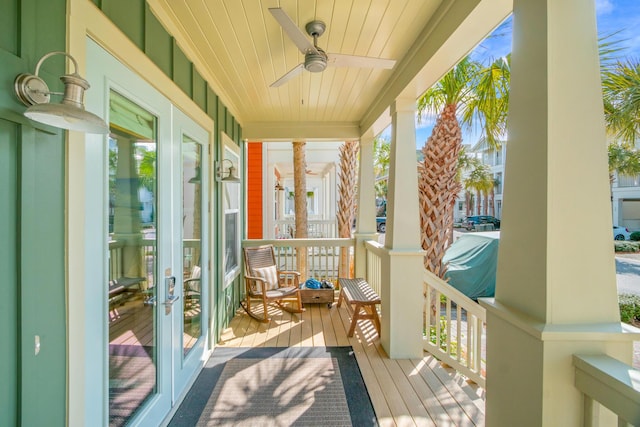 exterior space featuring wooden ceiling and ceiling fan