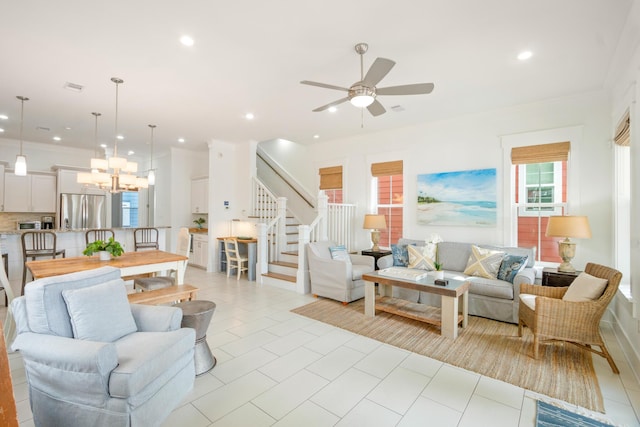 living room with stairs, light tile patterned floors, ornamental molding, and recessed lighting