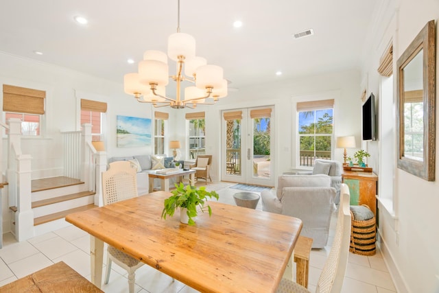 dining area with light tile patterned floors, a chandelier, recessed lighting, visible vents, and stairway