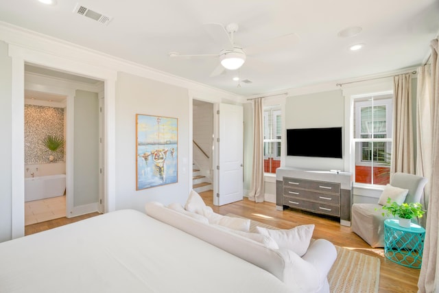 bedroom featuring recessed lighting, visible vents, baseboards, light wood-style floors, and crown molding