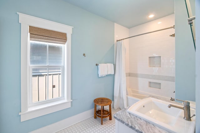 full bath with recessed lighting, shower / tub combo, vanity, baseboards, and tile patterned floors