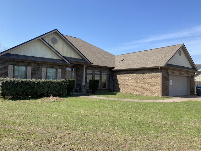 view of front of property with a garage and a front yard