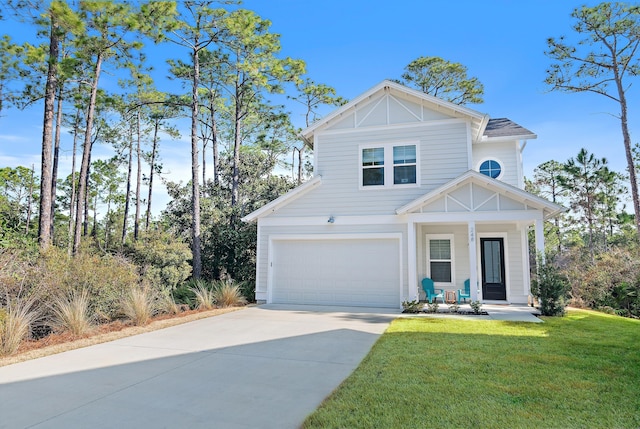 view of front of property with covered porch, concrete driveway, and a front yard